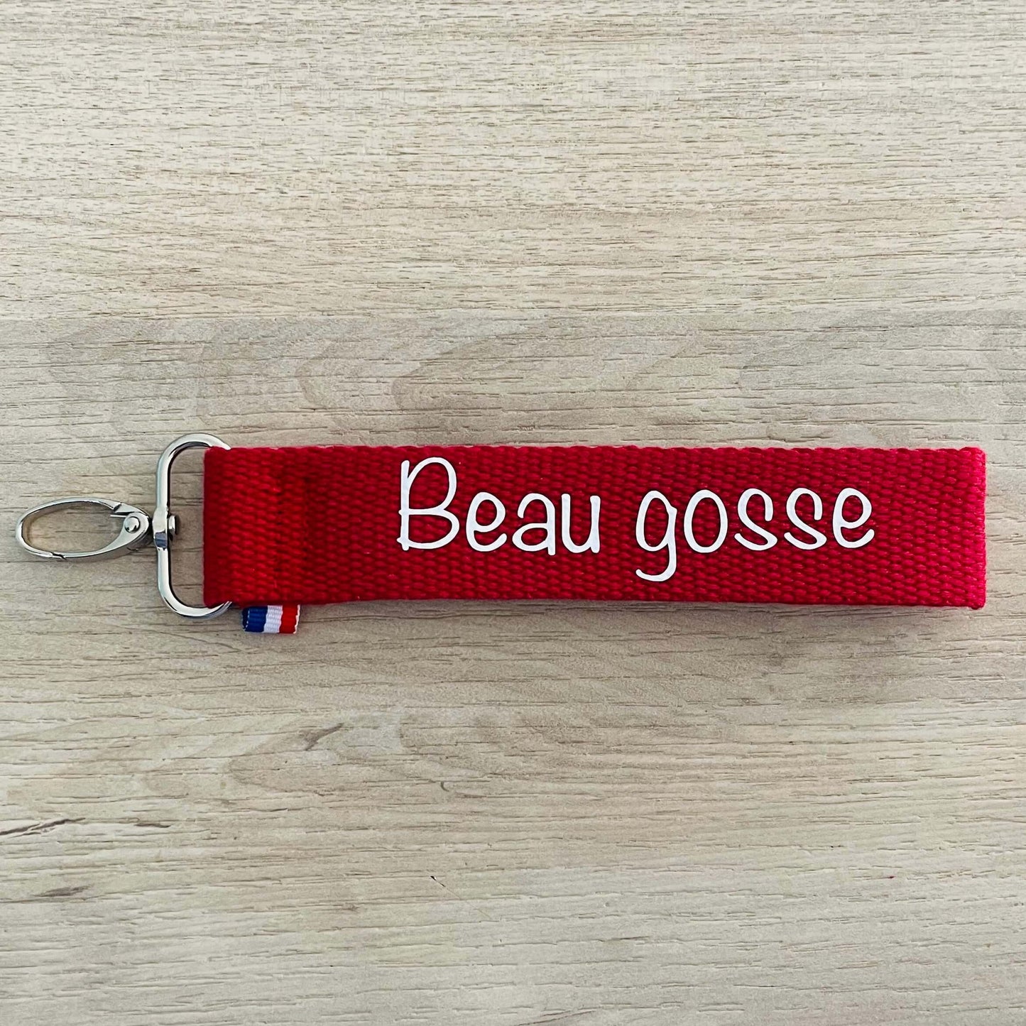 Porte clés, Beau gosse