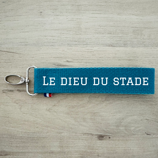 Porte clés, Le dieu du stade