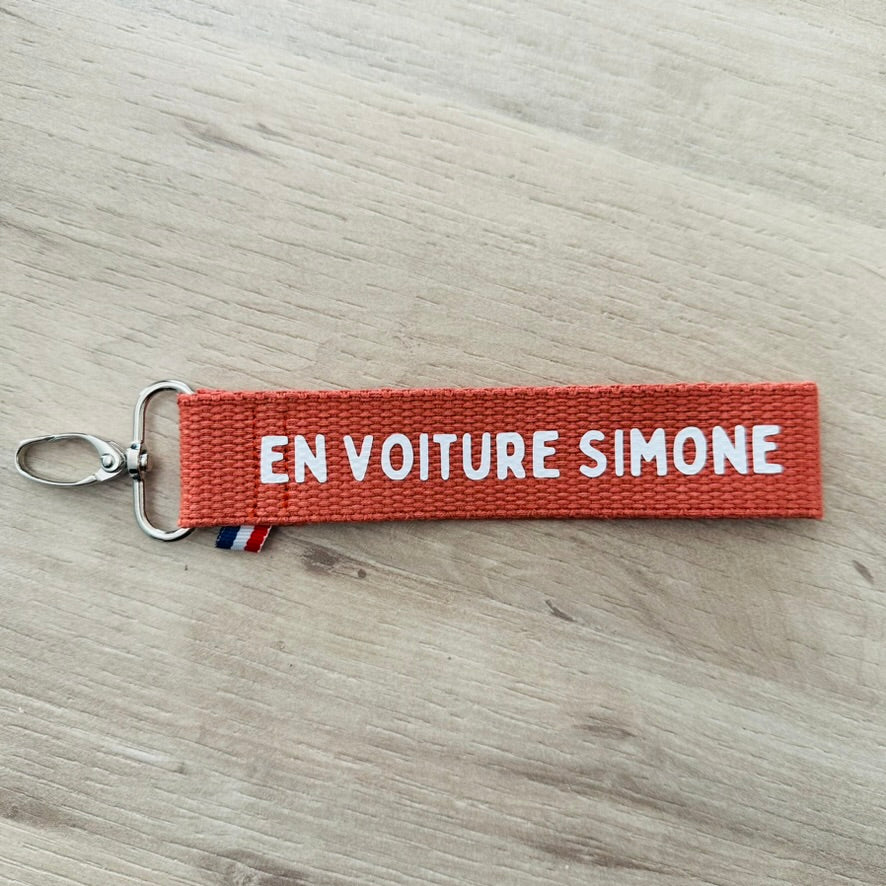 Porte clés, En voiture Simone