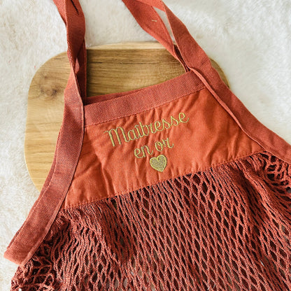 Sac filet, maîtresse en or